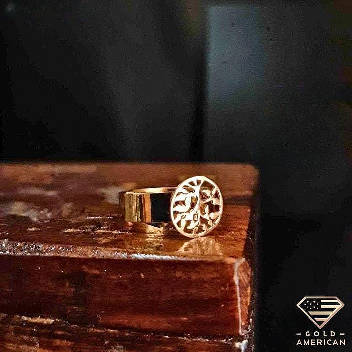 Gold Tree Ring on a carved wooden box