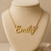 Gold script name necklace “Emily” with heart accent on delicate chain