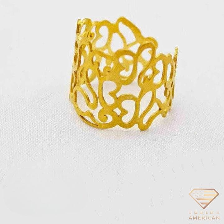 Intricate Gold Ring on a white background
