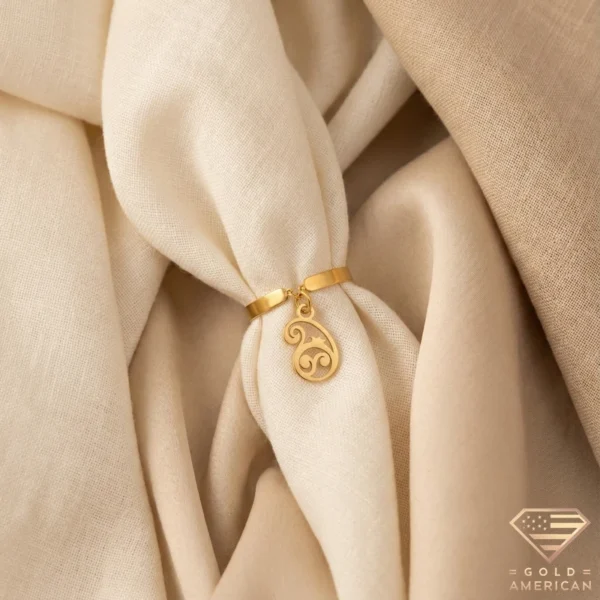 Artistic Gold Ring with Paisley Charm