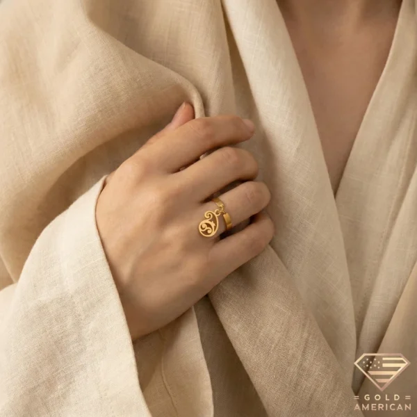 Artistic Gold Ring with Paisley Charm Clenched Hand