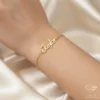 Charming Gold Name Bracelet Taylor