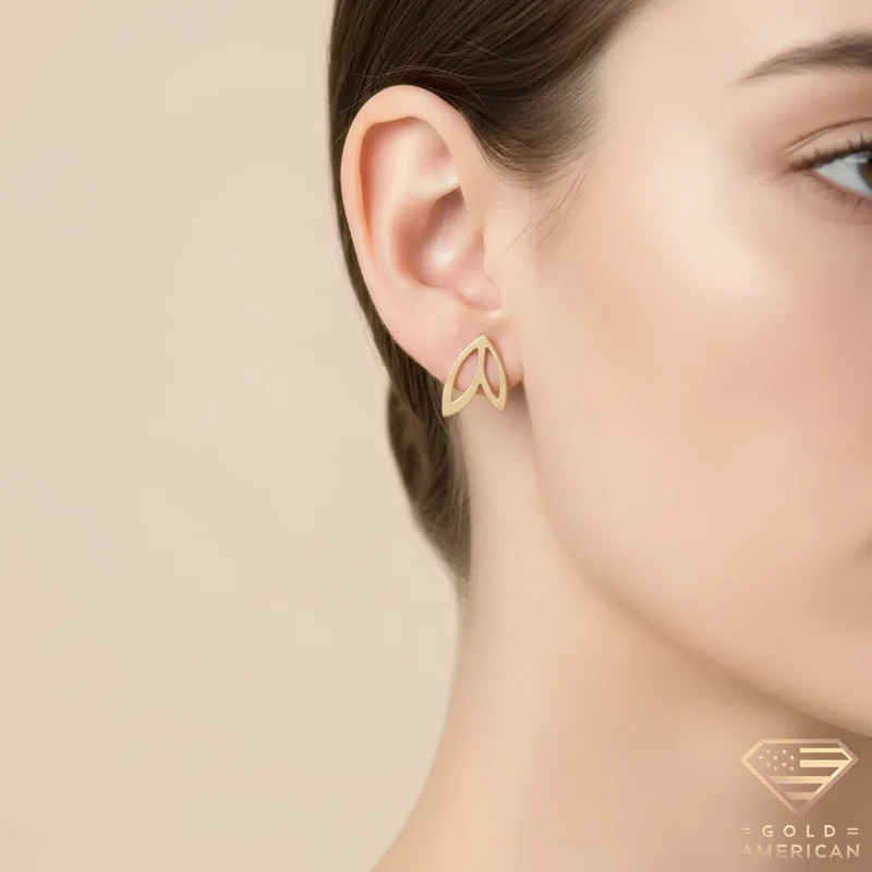 Double-Winged Gold Stud Earrings on Model