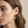Dual Entwined Triangles Gold Hoop Earrings on Model