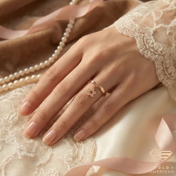 Flower Gold Ring with Charm on Hand Close up