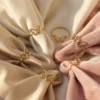 Minimal Butterfly Gold Rings