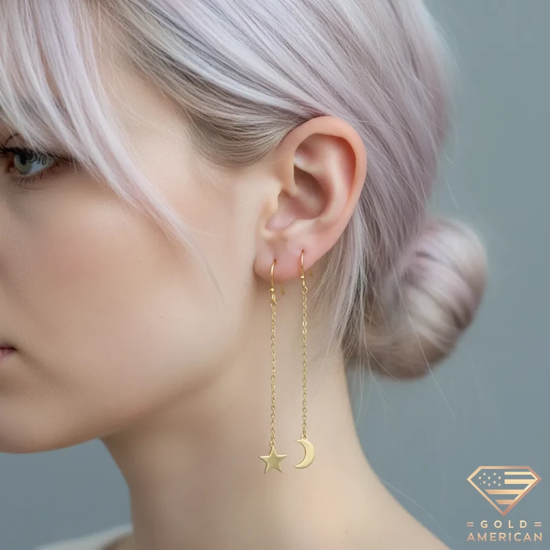 Moon and Star Gold Drop Earrings on Model