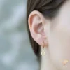 Royal Spade Gold Hoop Earrings on Model