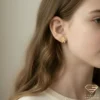 Gingerbread Man Gold Earrings Model Side Profile