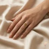 Parallel Poise Gold Name Ring on Hand Kate