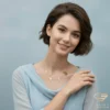 The Nutcracker Gold Necklace Model Hand on Shoulder