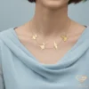 The Nutcracker Gold Necklace Model Zoomed in