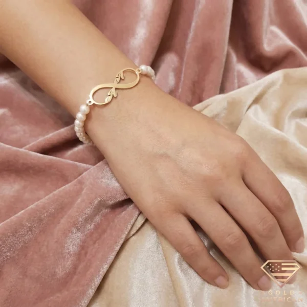 Pearl & Gold Infinity Initial Bracelet on Hand