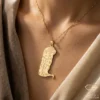 The Kiss Gold Art Pendant Necklace Model Close up