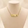 Gold Baby Feet Necklace