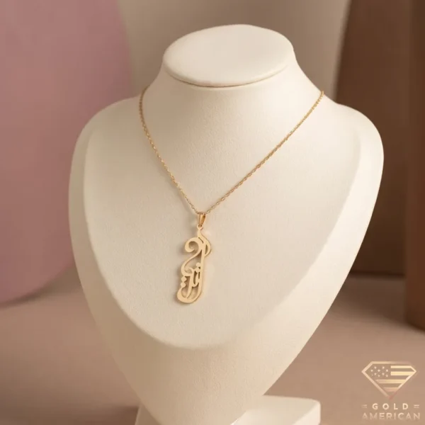 Atria Vertical Calligraphy Name Necklace displayed on a jewelry bust